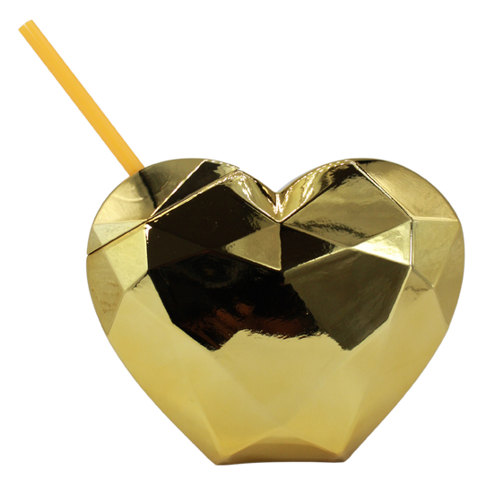 Gold metallic heart-shaped cup with faceted surface, lid, and yellow straw.