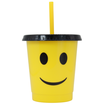 Yellow 16oz plastic cup with black smiling emoji face, black lid, and yellow straw.