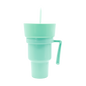 Mint green plastic party cup with handle, matching lid, and straw, 950ml capacity.